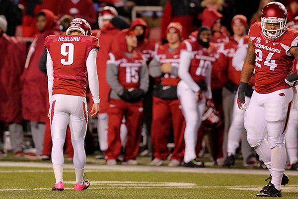 Arkansas kicker Cole Hedlund (9) walks off the field after his field goal is blocked in the final minute of the Razorbacks' loss to Mississippi State on Saturday, Nov. 21, 2015, at Razorback Stadium in Fayetteville. 