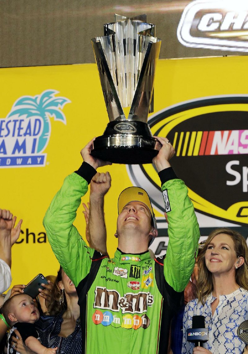 Kyle Busch started the season with a crash that left him with a broken right leg and left foot, but he completed it by winning his first NASCAR Sprint Cup championship Sunday.