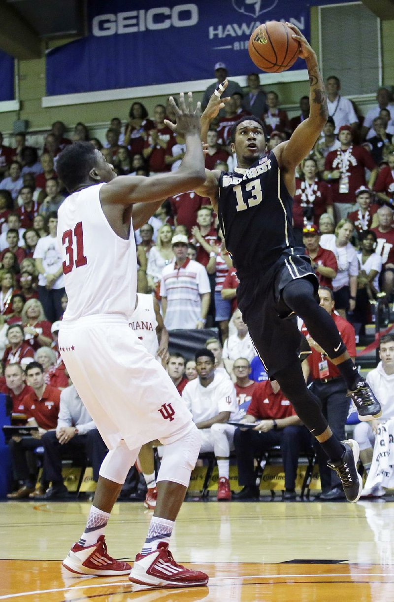 Wake Forest guard Bryant Crawford (13) scored 13 points, including a layup with 3.2 seconds left to push the Demon Deacons to an 82-78 victory over No. 13 Indiana on Monday.