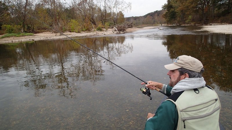 The Elk River near Pineville Mo., is peaceful, quiet and ideal for fishing during autumn. Russ Tonkinson of Rogers enjoys a float-fishing trip Oct. 30.