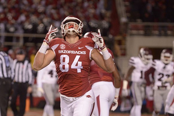 Arkansas tight end Hunter Henry celebrates after scoring a touchdown during the third quarter of a game against Mississippi State on Saturday, Nov. 21, 2015, at Razorback Stadium in Fayetteville. 