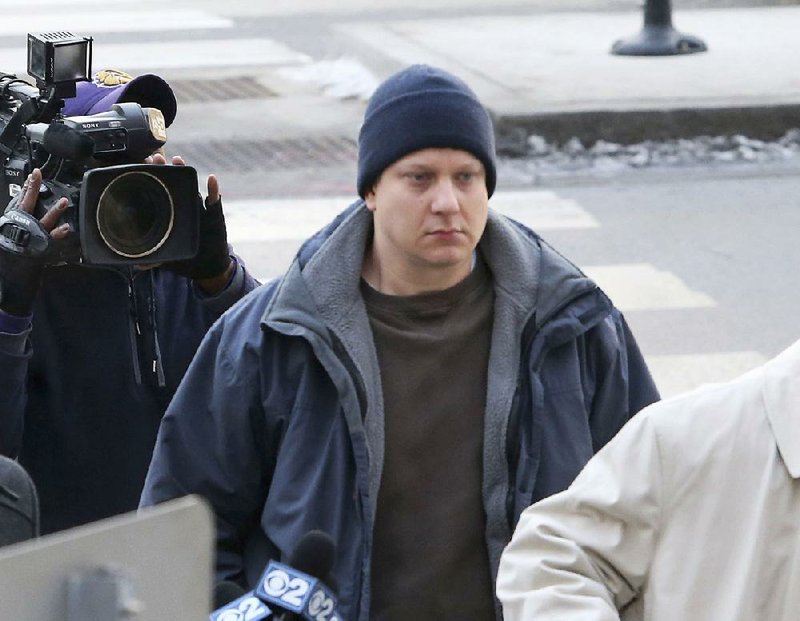 Chicago police officer Jason Van Dyke arrives at the Leighton Criminal Courthouse in Chicago on Tuesday. Van Dyke was charged with first-degree murder in the killing of 17-year-old Laquan McDonald.
