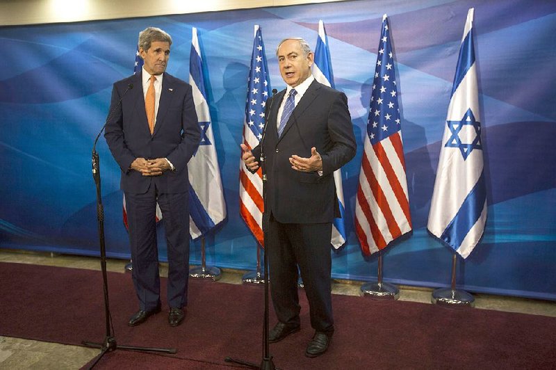 Israeli Prime Minister Benjamin Netanyahu speaks Tuesday during a meeting with U.S. Secretary of State John Kerry at the prime minister’s office in Jerusalem. 