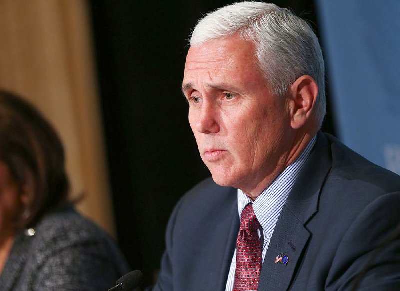 Indiana Gov. Mike Pence speaks during a news conference at the Republican Governors Association annual conference Wednesday, Nov. 18, 2015, in Las Vegas. 