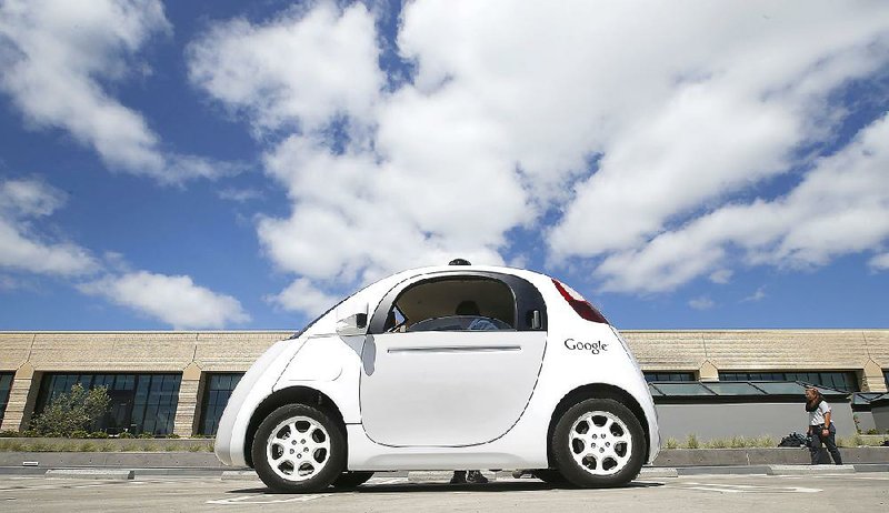 Google’s self-driving prototype is presented at a demonstration at the Google campus in Mountain View, Calif., in May. 