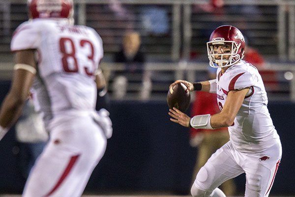 Arkansas quarterback Brandon Allen looks to pass to tight end Jeremy Sprinkle on Saturday, Nov. 7, 2015, during the fourth quarter against Ole Miss at Vaught-Hemingway Stadium in Oxford, Miss.