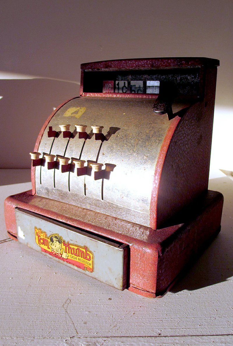 Right: Antique toys and items, such as this cash register, are used in &#8220;The Toy Shoppe.&#8221;