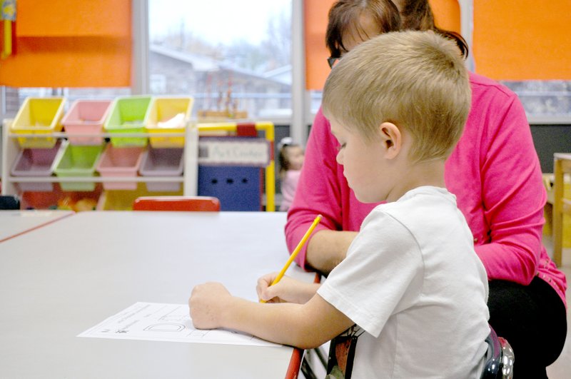 Rachel Dickerson McDonald County Press A boy practices his letters in an Early Childhood Special Education classroom at Anderson Elementary School.