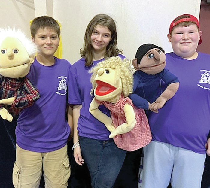 Submitted photo Seventh-grade students, from left, Cole Lair, Kaid Vaughn, Nate Oosterhous, Kalea Tweedle and Dylan Holcombe in the gifted and talented program at Centerpoint Intermediate School presented a puppet show, "Don't do this, you can't do that," to students at the primary school for Red Ribbon Week. Sixth- and seventh-grade students presented the puppet show, discussed facts about drug use and led activity time with the younger students.