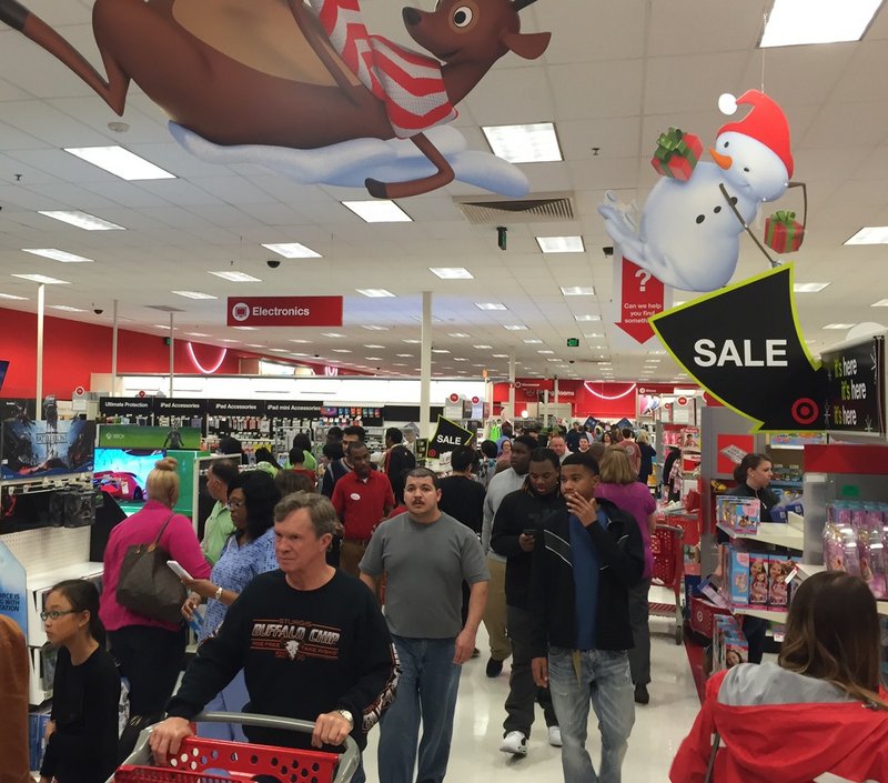 Shoppers fill aisles inside Target at Chenal Parkway in west Little Rock shortly after the store opened at 6 p.m. Thursday, Nov. 26, 2015, for its Black Friday sale. 