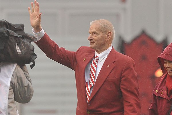 Former Arkansas baseball coach Norm DeBriyn is recognized prior to a football game between Arkansas and Missouri on Friday, Nov. 27, 2015, at Razorback Stadium in Fayetteville. 