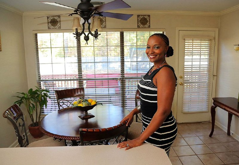 Tionna Jenkins in her kitchen.
