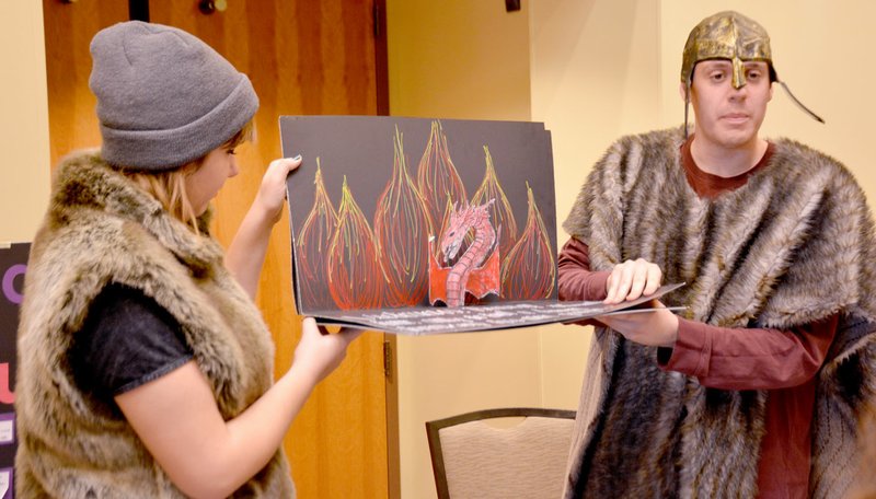 Michael Burchfiel/Siloam Sunday Claire Grant and Austin ellis explain the timeless epic Beowulf - through the medium of pop-up book.