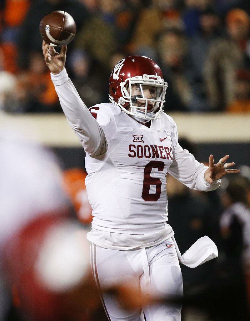 Oklahoma quarterback Baker Mayfield passed for 180 yards and 2 touchdowns and rushed for 77 yards and 1 touchdown Saturday to help the Sooners beat Oklahoma State 58-23 to win the Big 12 championship.