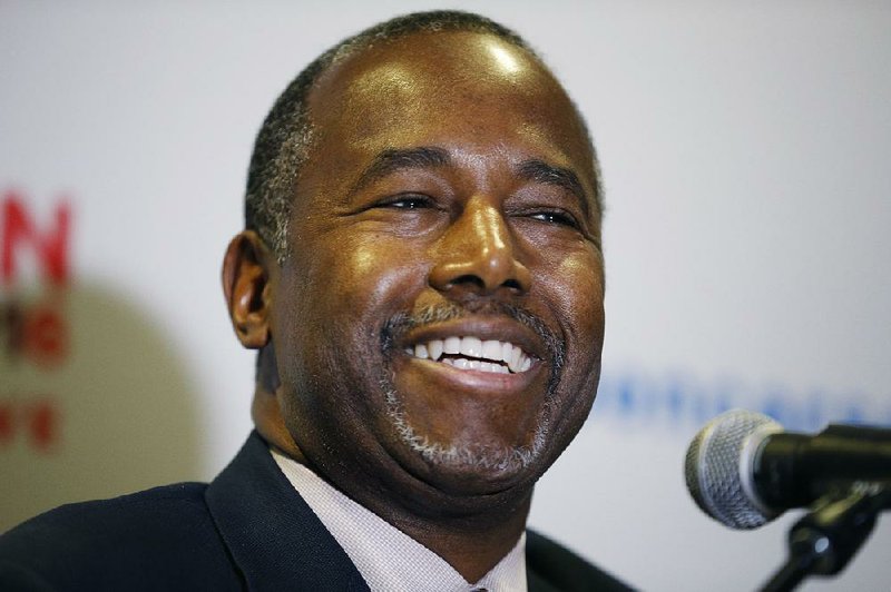 In this Nov. 23, 2015 photo, Republican presidential candidate, Dr. Ben Carson holds a news conference after a rally in Pahrump, Nev. 