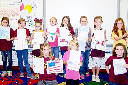 Submitted photo Third-grade students in Jessica Carr's class at Lake Hamilton Elementary School wrote letters and made cards to send to veterans in honor of Veterans Day.