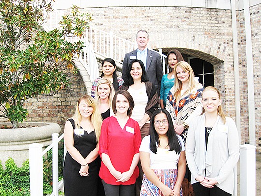 Submitted photo SCHOLARSHIPS AWARDED: Nine of the AAUW scholarship recipients honored at the annual luncheon are Briana Tedford, front left, Stephanie Carpenter, Oralia Garcia, Amanda Pennington; second row, Jennifer Blees, Anne Benoit; third, Remedios Santos, Marcella Mendez and Ines Ramirez. In back is John Hogan, president of National Park College.