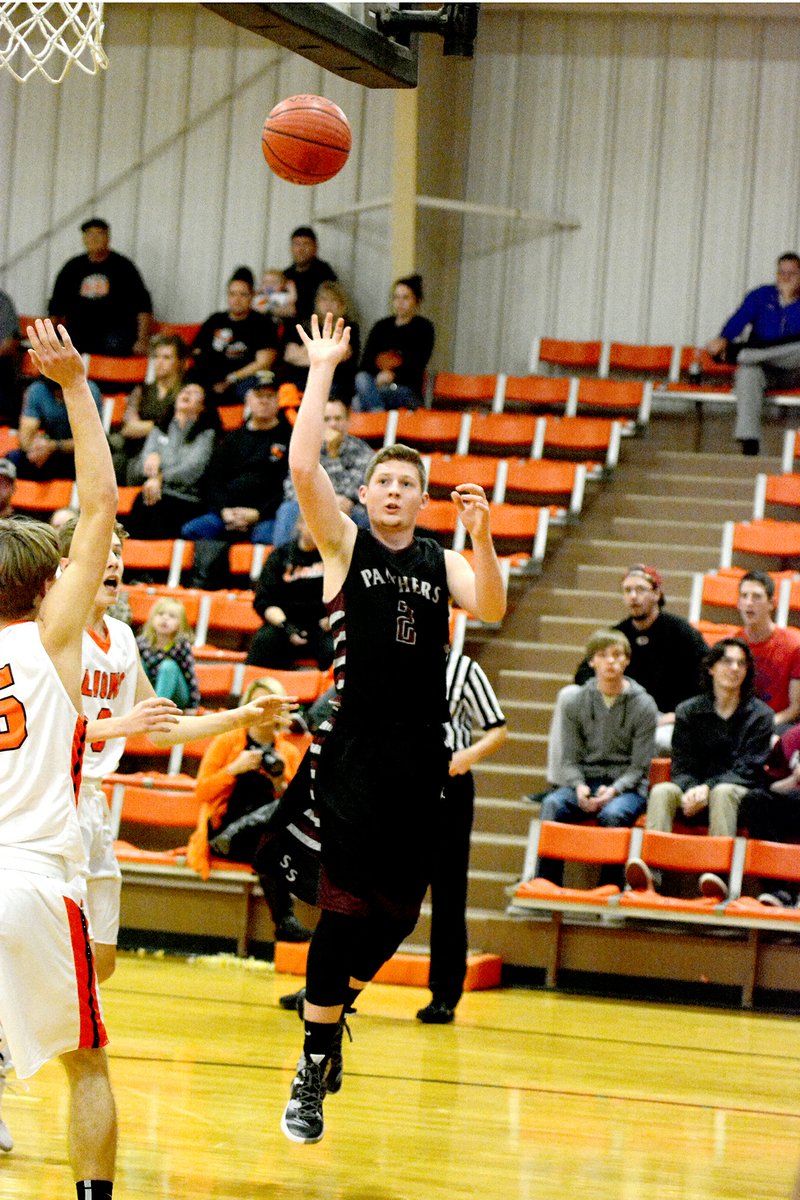 Bud Sullins/Special to Siloam Sunday Siloam Springs senior guard Tyler Newton puts up a shot against Gravette on Nov. 19. Newton and the Panthers play in the 51st annual Republic (Mo.) Boys Basketball Tournament on Tuesday against tournament host Republic Tigers.