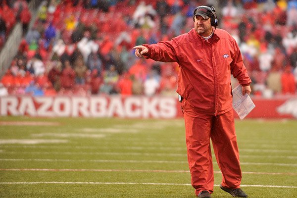 Arkansas coach Bret Bielema instructs players during a game against Missouri on Friday, Nov. 27, 2015, at Razorback Stadium in Fayetteville. 