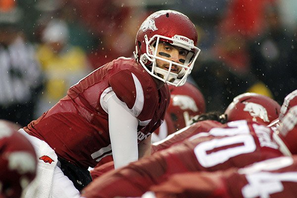 Arkansas' Brandon Allen (10) calls out to his teammates during the first half of an NCAA college football game against Missouri, Friday, Nov. 27, 2015, in Fayetteville, Ark. (AP Photo/Samantha Baker)