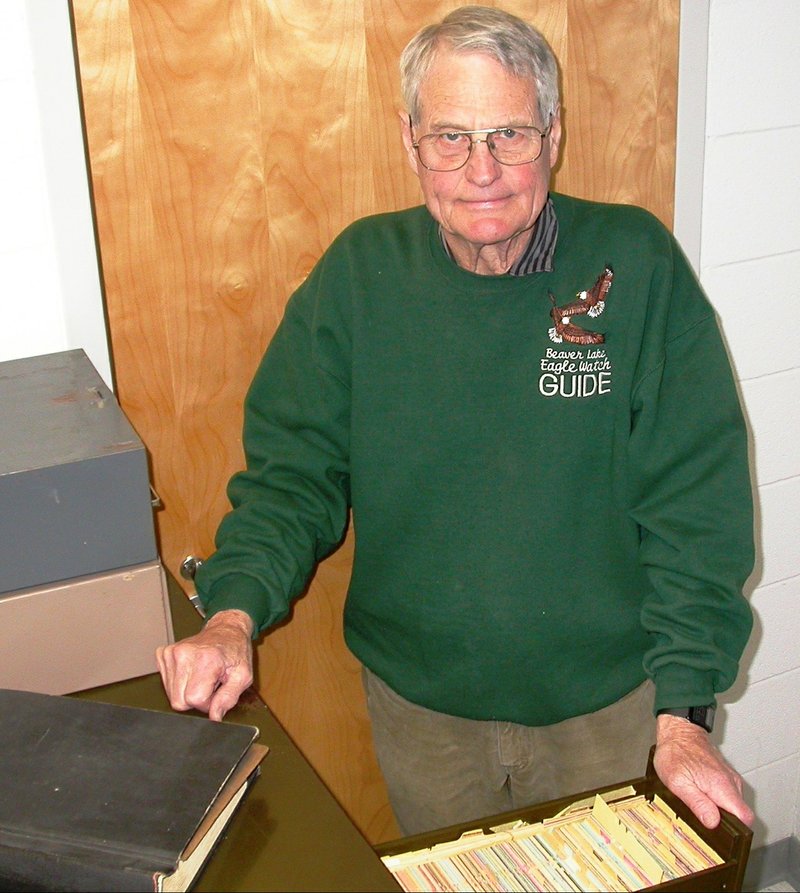Douglas James shows the card files he compiled beginning in 1953 when he was a new zoology professor for the University of Arkansas at Fayetteville. James’ 34,000 cards are being transcribed by volunteers into a digital database in a project called the Card-inal Club.