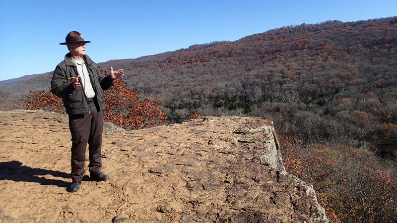 Tim Scott, assistant superintendent, takes in the view Nov. 19 from the Yellow Rock Trail overlook at Devil’s Den State Park. Hiking is the most popular activity at Devil’s Den, which was named 2015 Region 1 Park of the Year.