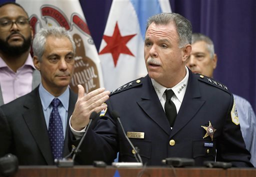 In this Nov. 24, 2015 file photo, Chicago Police Superintendent Garry McCarthy, right, speaks about first-degree murder charges against police officer Jason Van Dyke in the death of 17-year-old Laquan McDonald, as Mayor Rahm Emanuel looks on at left.
