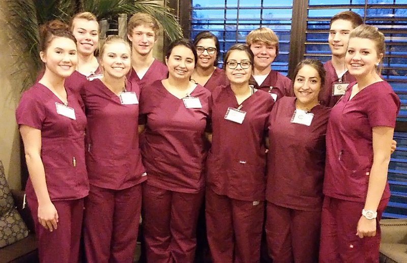 Photo by Yolonda Moll Gentry&#8217;s CNA students paused for a photo during their first day of clinical experience at North Hills Life Care and Rehab in Fayetteville on Nov. 21. Pictured are: Destiny Swatsenberg, Kaci Starkey, Haylee Jackson, Erika Magana, Tehya Romero, Lexie West, Haley Borgeteien-James, James Fell, Myrna Ruzek, Justin Elliott and Bryan Harris.