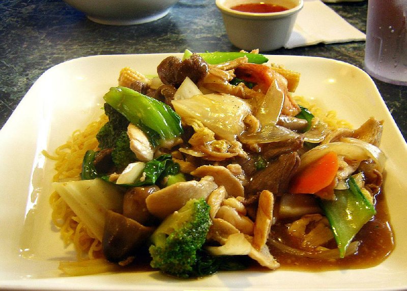 The Stir Fried Noodle Combination at Chopsticks Pho in Jacksonville is made with shrimp, beef, broccoli, onions, carrots, mushrooms and noodles in a flavorful brown sauce. 