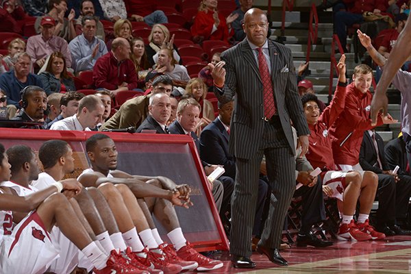 Arkansas coach Mike Anderson instructs players during a game against Charleston Southern on Friday, Nov. 20, 2015, at Bud Walton Arena in Fayetteville. 