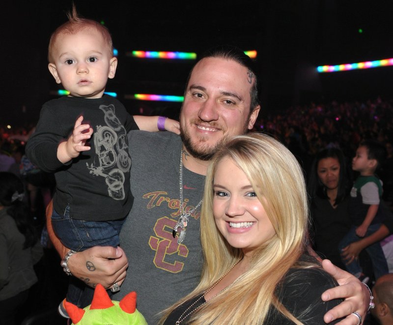 In this Nov. 30, 2013 file photo, Tiffany Thornton, right, with husband Christopher Carney and son Kenneth Carney attend A Very Awesome Yo Gabba Gabba! Live! Holiday Show, at Nokia Theater, L.A. Live in Los Angeles. 