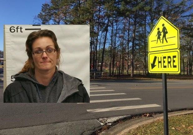 A mug shot of Chasity Phillips released by the Maumelle Police Department is overlaid on a photo of the crosswalk where a 5-year-old boy was hit by an SUV Friday morning.