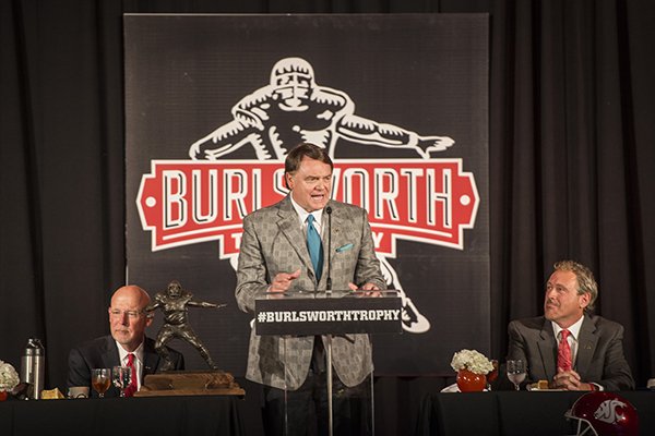 Houston Nutt, former Arkansas head football coach, gives a short speech Monday, Dec. 7, 2015, during the presentation of the Brandon Burlsworth Trophy at the Springdale Convention Center.