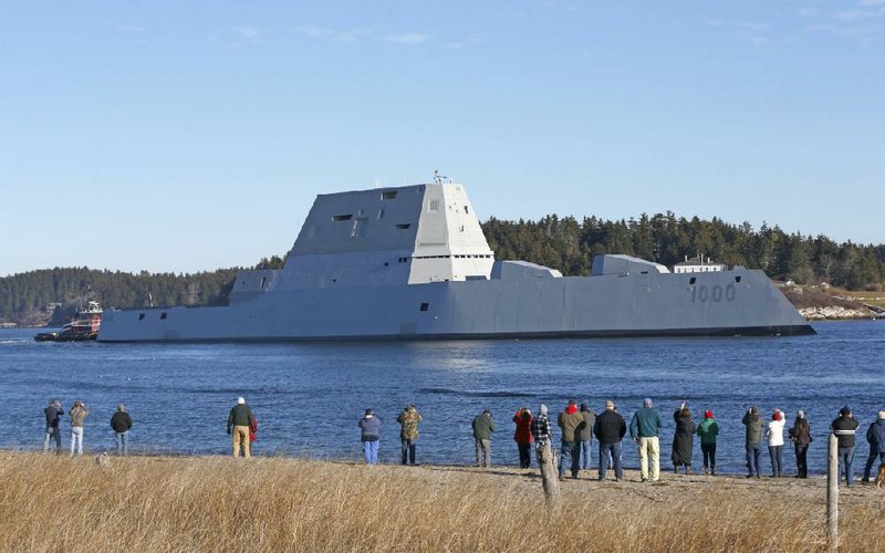 The U.S. Navy’s first Zumwalt-class destroyer leaves the Kennebec River, passing spectators near Fort Popham on Monday, in Phippsburg, Maine.