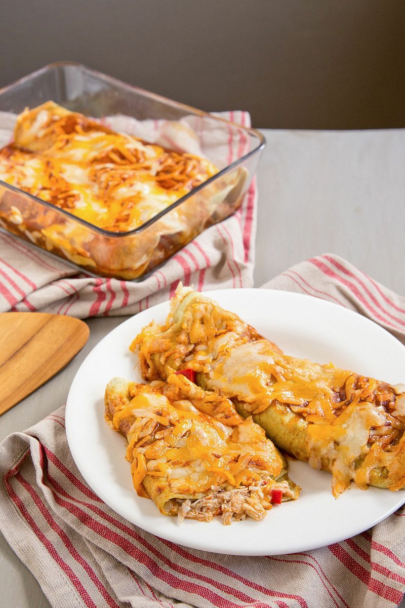 Cook the enchiladas until the cheese is melted and the sauce is bubbling.