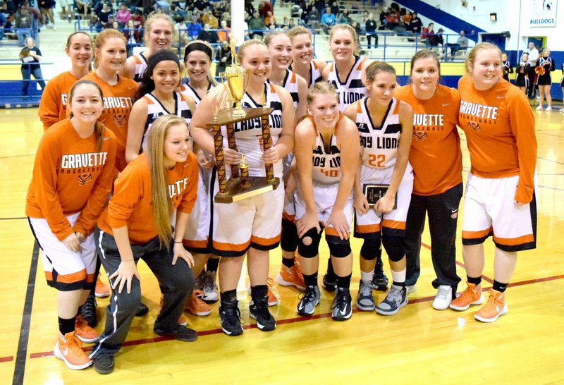 Photo by Mike Eckels The Gravette Lady Lions took home the girls&#8217; basketball championship of the 2015 Decatur Holiday Tournament at Peterson Gym in Decatur Dec. 5. The Lady Lions defeated the Lady Wolves from Lincoln, 57 to 49.