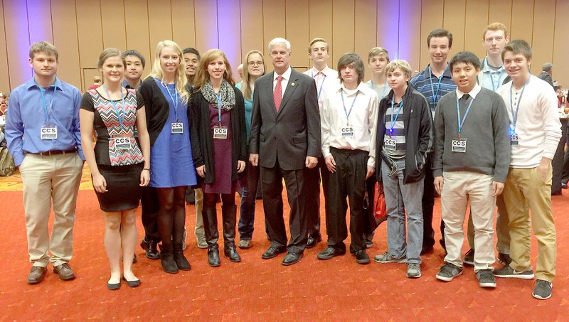 Submitted Photo Gentry High School business students recently attended the Norhtwest Arkansas Technology Institute sponsored by the Bentonville and Bella Vista Chambers of Commerce. They are pictured with U.S. Congressman Steve Womack.