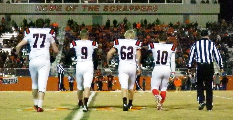 TIMES photograph by Annette Beard Football seniors Brent Ferguson, Ethan Burton, Hunter Carrigan and Gage Cawthon were captains for the semi-final football game Friday night in Nashville.
