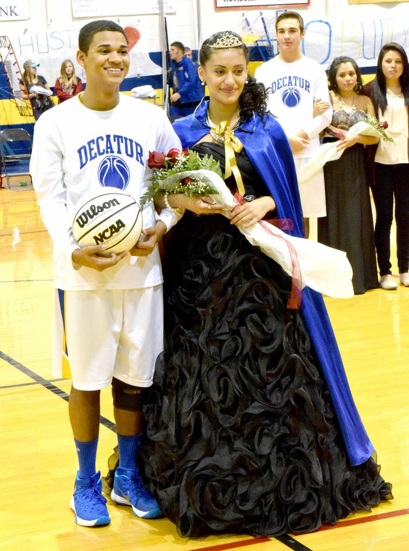 Photo by Mike Eckels Alex Morrow (left) and Brandy Martinez were crowned Decatur High Colors Day king and queen Nov. 4 during the 2015 Decatur Holiday Tournament at Peterson Gym in Decatur.