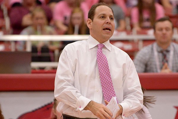 Arkansas coach Robert Pulliza instructs players during a match against Ole Miss on Sunday, Oct. 18, 2015, at Barnhill Arena in Fayetteville. 