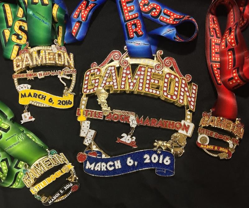 The 14th Annual Little Rock Marathon medals feature a "vintage board game theme," race officials said. 