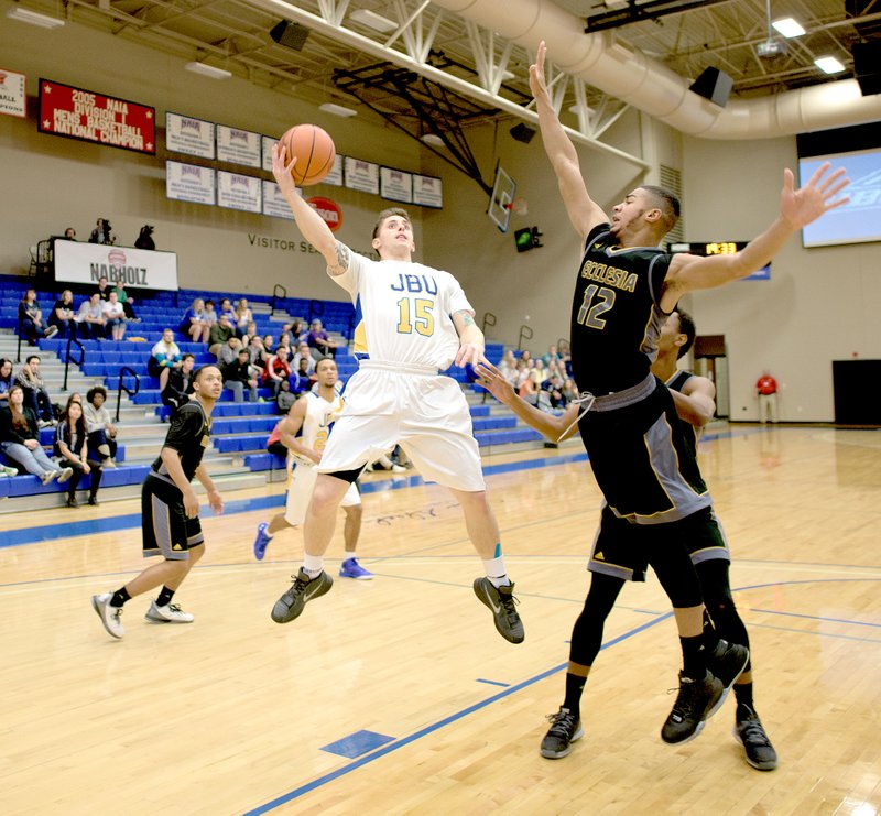 Photo courtesy of JBU Sports Information Luke Moyer scored 30 points to lead JBU to a 101-60 win against Ecclesia on Friday at Bill George Arena.