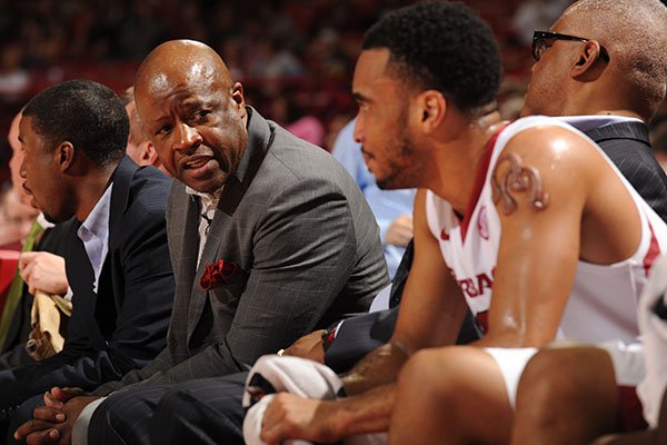 Arkansas coach Mike Anderson (left) speaks with Jabril Durham on the bench against Tennessee Tech Saturday, Dec. 12, 2015, during the second half at Bud Walton Arena.