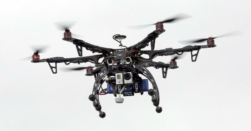 A drone is demonstrated in Brigham City, Utah, in this file photo. The Federal Aviation Administration announced Monday that many drones will have to be registered to make it easier to identify owners.