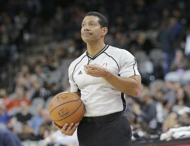 NBA referee Bill Kennedy (55) during the second half of an NBA basketball game between the San Antonio Spurs and Utah Jazz, Monday, Dec. 14, 2015, in San Antonio.