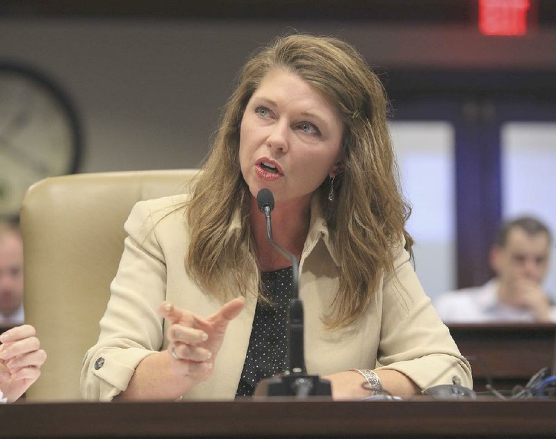 Rep. Michelle Gray, R-Melbourne, presents a proposal Tuesday to the Health Reform Legislative Task Force for changes to Medicaid. Gov. Asa Hutchinson will address the task force today.