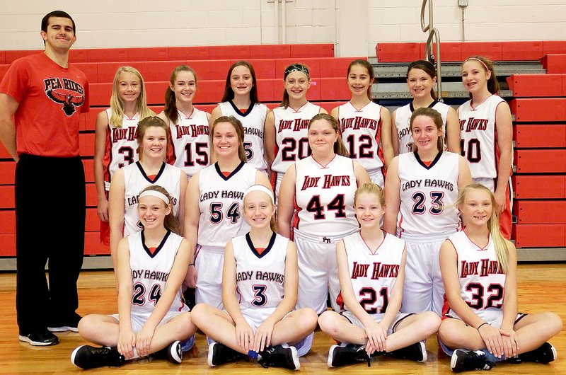 TIMES photograph by Annette Beard Jr. High Lady Blackhawks are ninth-graders: No. 3, Hollyn Davis; No. 10, Halley Laster; No. 23, Meredith Mitchell; No. 54, Bailey Johnson; No. 33, Maria Socha; No. 24, Vittoria Polanowski; and No. 11, Kaitlyn Swope; eighth-graders are: No. 15, Cassidy Mooneyhan; No. 34, KynLey Burton; No. 40, Kadense McDonald; No. 12, Kloey Evenson; No. 20, Samantha Bott; No. 21, Emily Loewe; No. 50, Maddie Gafford; No. 54, Porscha Polanowski; No. 32, Karissa Martinez; No. 44, Shae Gilbertson; and seventh-graders: No. 22, Aiden Dayberry; and No. 13, Blaklee Winn; Coach is Rudy Sanchez; and managers are Reigh-Ann Goldberg and Karime Rascon.