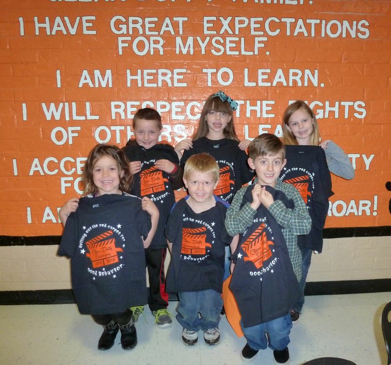 Submitted Photo PAWS (Pawsitive and Wise Students) winners for the month of December at Glenn Duffy Elementary School were honored at the December &quot;Rise and Shine&quot; assembly. December winners, shown here displaying their PAWS student of the month t-shirts, are Jasmine Brogdon of Gravette, front left, Preston Tinsley of Gravette, Canaan Johnson of Bella Vista, Colton Priebe of Gravette, back left, Alexis Crawley of Gravette and Alexandria McDermott of Sulphur Springs.