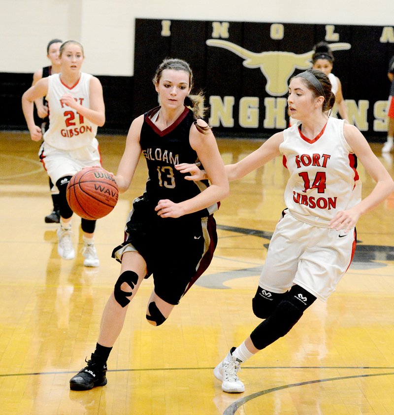 Bud Sullins/Special to the Herald-Leader Siloam Springs senior guard Abby Cox dribbles the ball down the floor with Fort Gibson&#8217;s Kayci Glover guarding her during Saturday&#8217;s championship game of the Jerry Oquin Invitational in Inola, Okla.