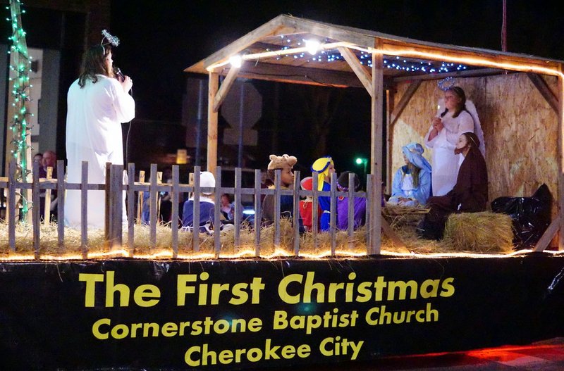 Cornerstone Baptist Church had a live nativity on its float, including an angels&#8217; chorus sung by Audra Weathers.